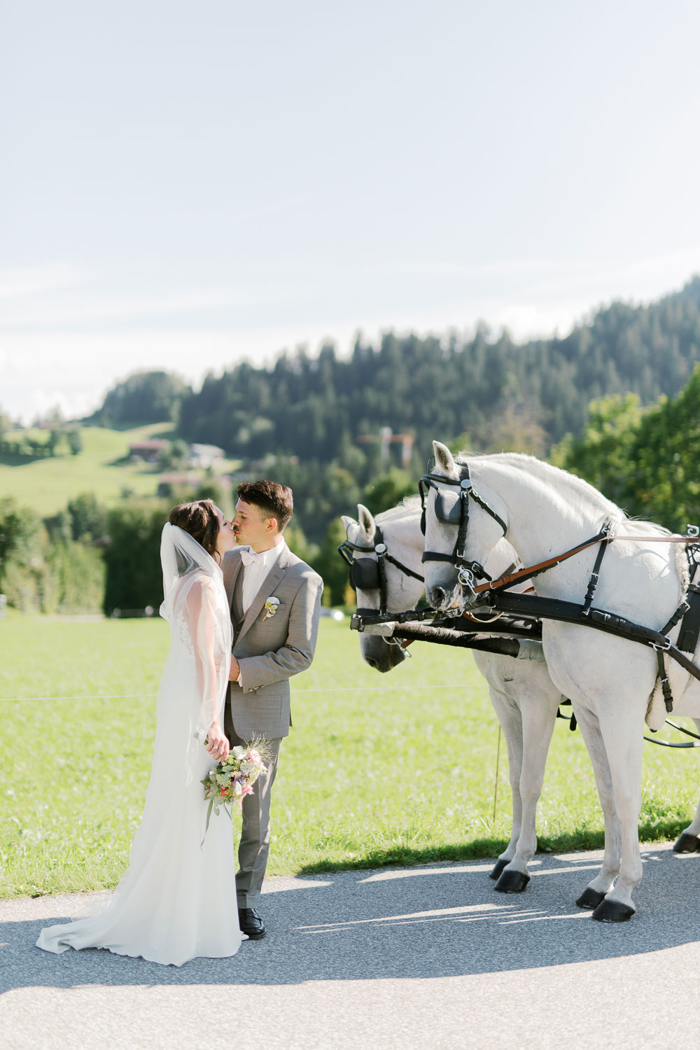 mountain weddding in tirol and horse carriage